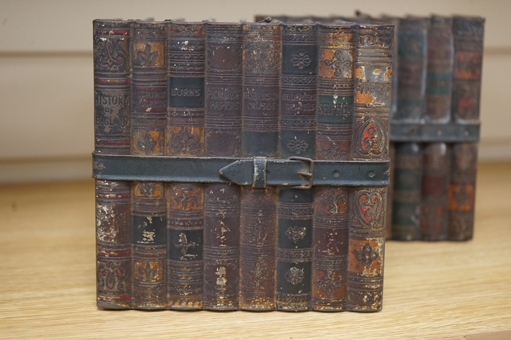 Two Huntley and Palmers novelty biscuit tins, each modelled as a set of books, 16cm
